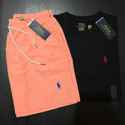 Orange shorts and black t-shirt with Polo Ralph Lauren logo on a dark background