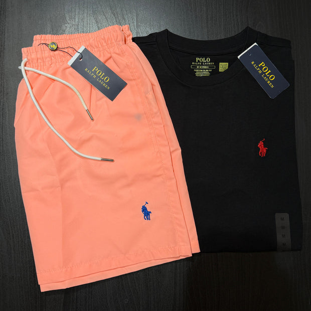 Orange shorts and black t-shirt with Polo Ralph Lauren logo on a dark background